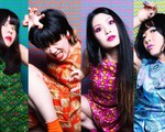 Individual vibrant portraits of each member of four-piece Otoboke Beaver, sliced together in vertical sections.