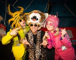 Portrait of eccentric group Peelander-Z making silly faces toward the camera.