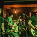 A colour photo shows four-piece band Yarbo playing at an indoor venue.